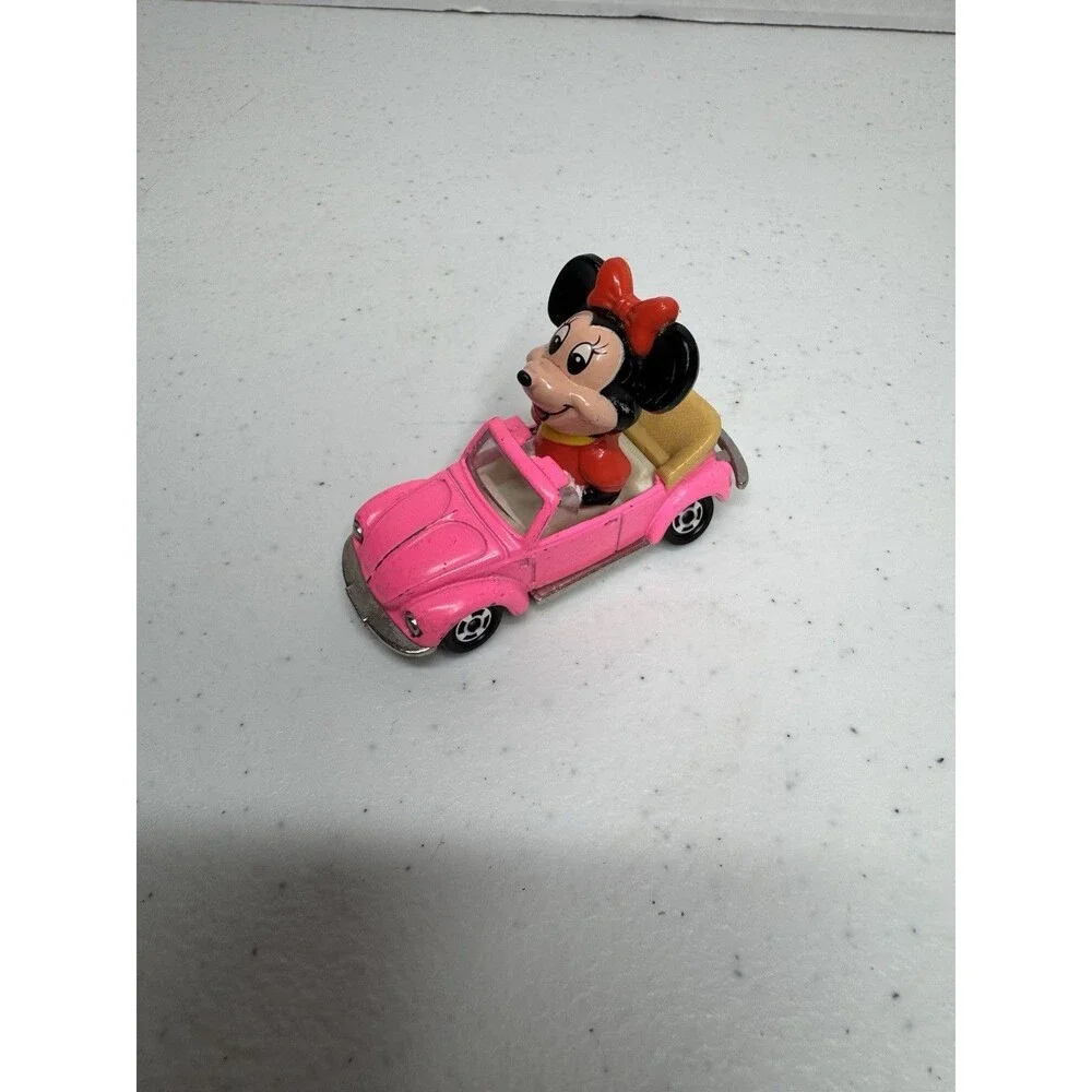 Vintage Disney Minnie Mouse in Diecast Pink Voltswagen Bug 1:64 Scale